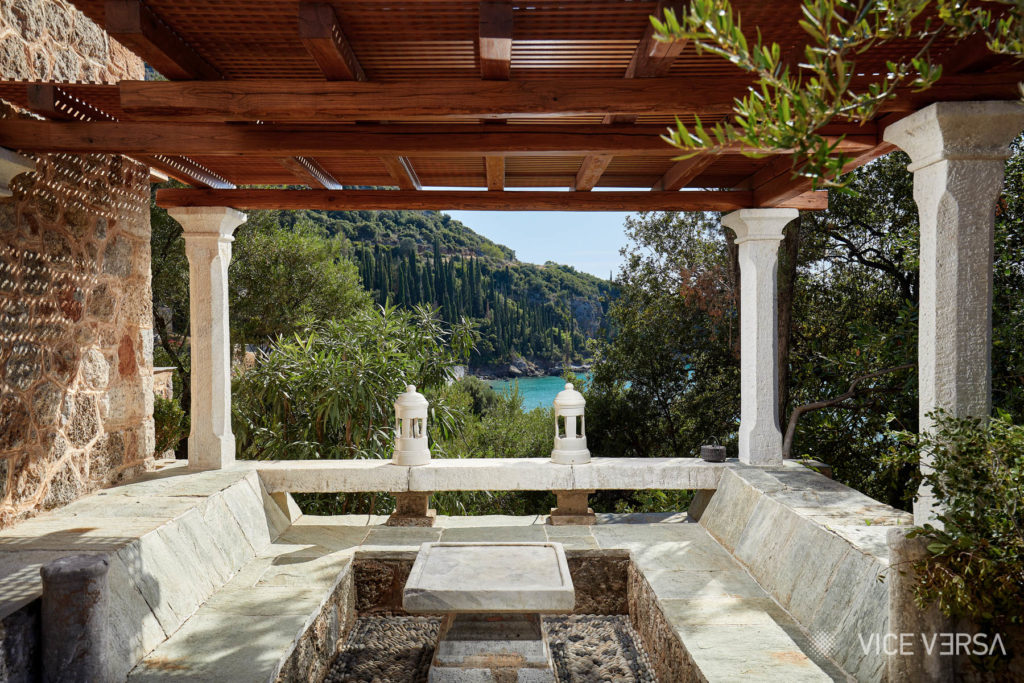 Outdoor sitting area overlooking Kalamitsi Bay at Leigh Fermor House
