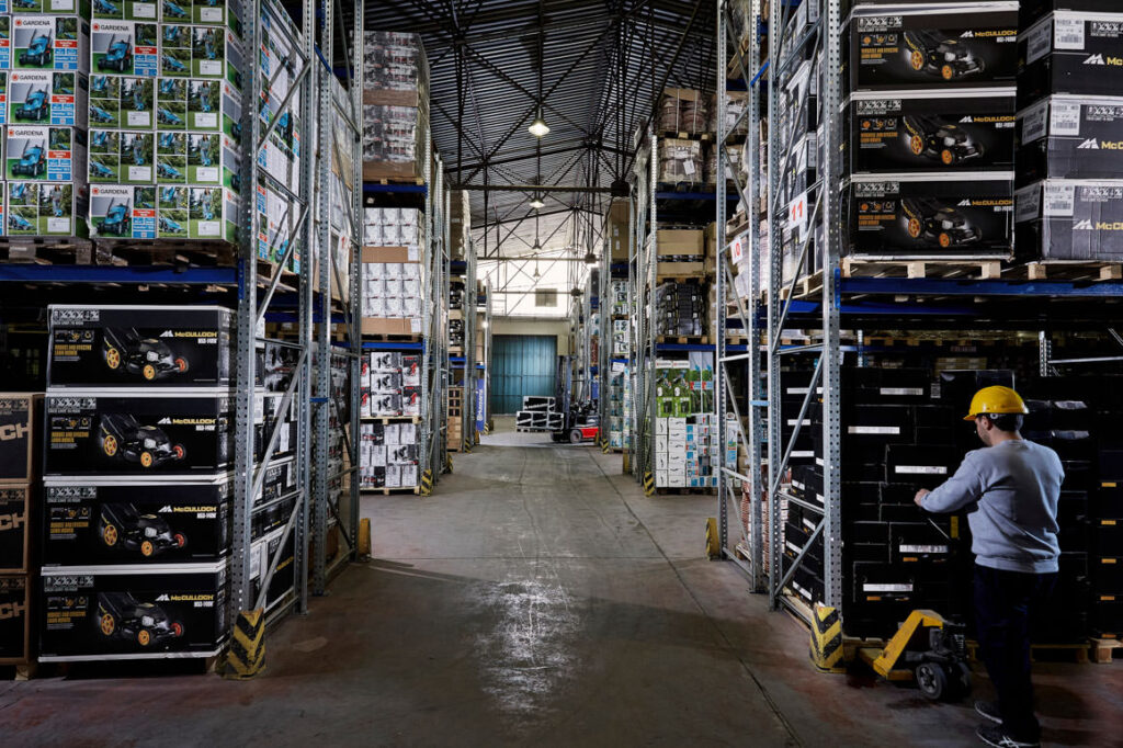 Papadopoulos SA storage hangar with shelving and merchandise