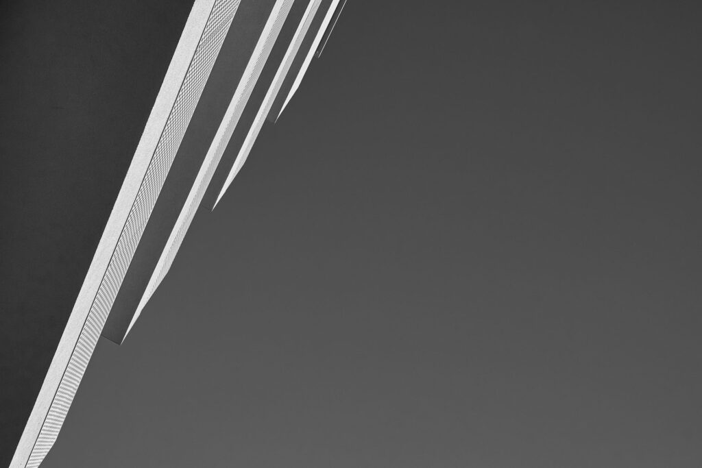 Minimal black-and-white exterior of Acacia Residences in Athens