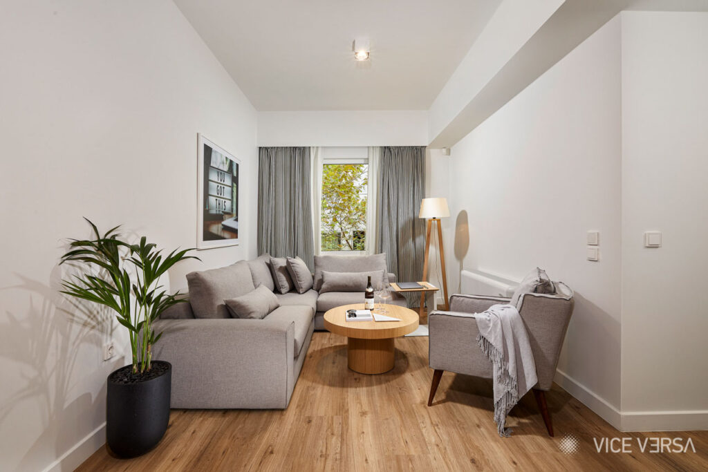 Styled lounge with tree views at Viola Residences Athens