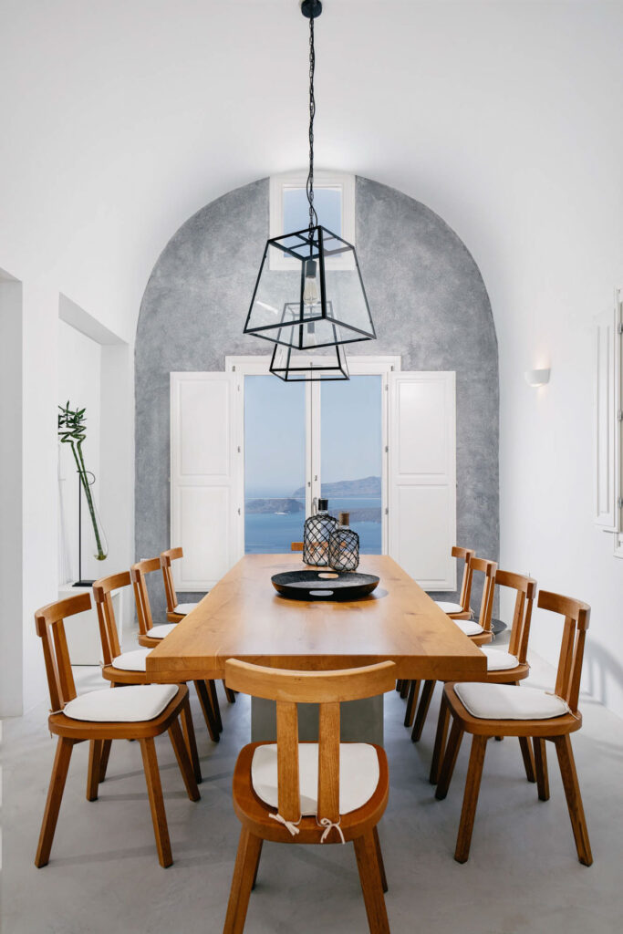 Nafsika Estate dining area overlooking Nea Kameni and Palea Kameni