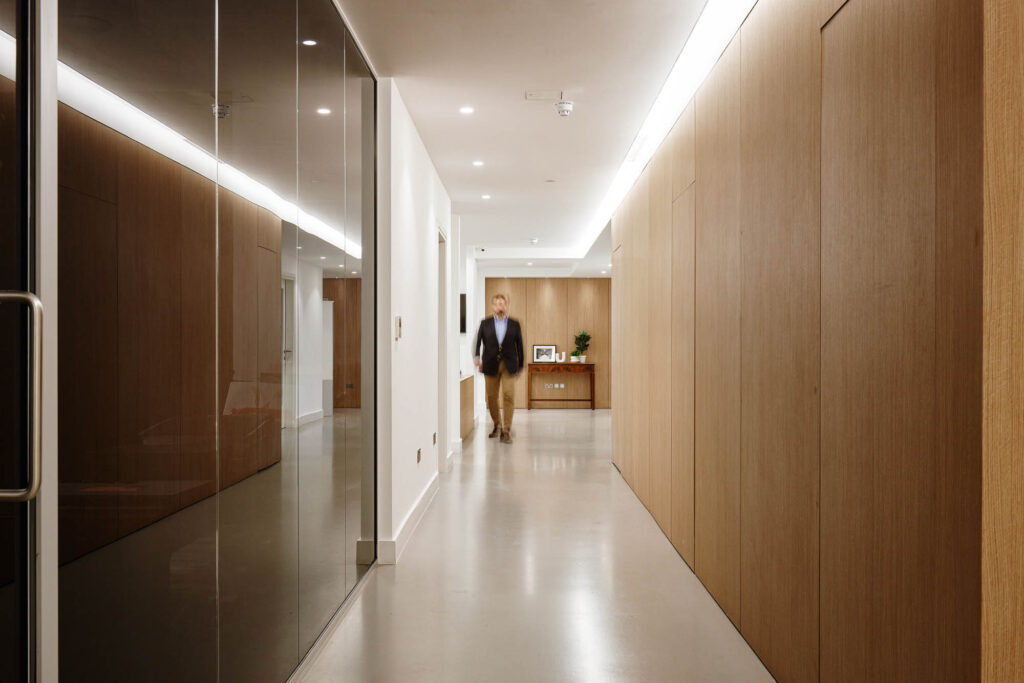 Euroterra Capital office corridor with blurred figure
