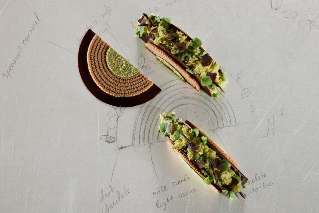 Crescent Garden signature pastry on a creative editorial background