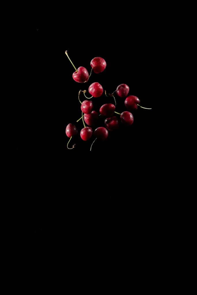 suspended mid air cherries from the Callebaut global campaign photo shoot