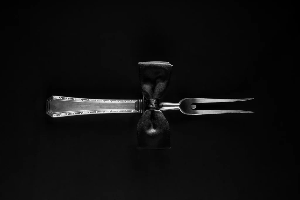 Vintage silver fork with bow tie for Telemachos Athens fine dining restaurant