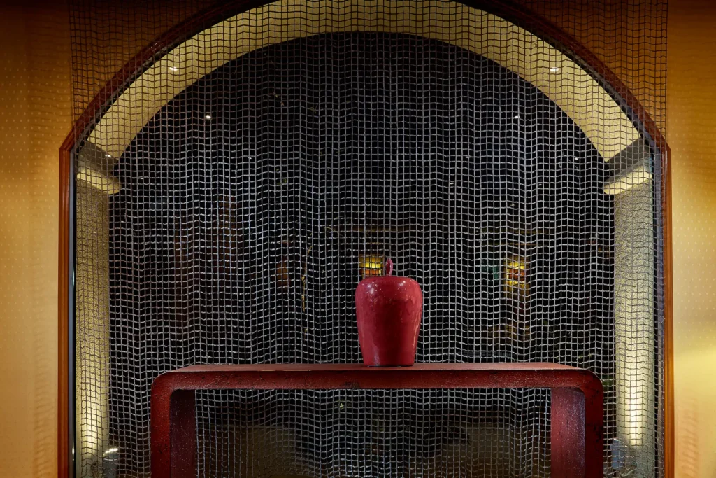 Decorative mosaic corner with red vase at Rodos Park Hotel