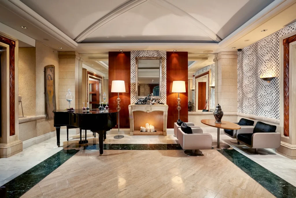 Guest lounge at Rodos Park Hotel with classical decoration and piano