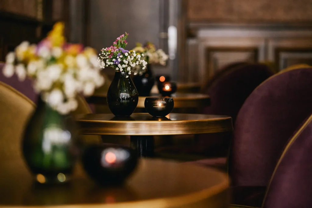 Selective-focus table and interior details inside boutique cafe