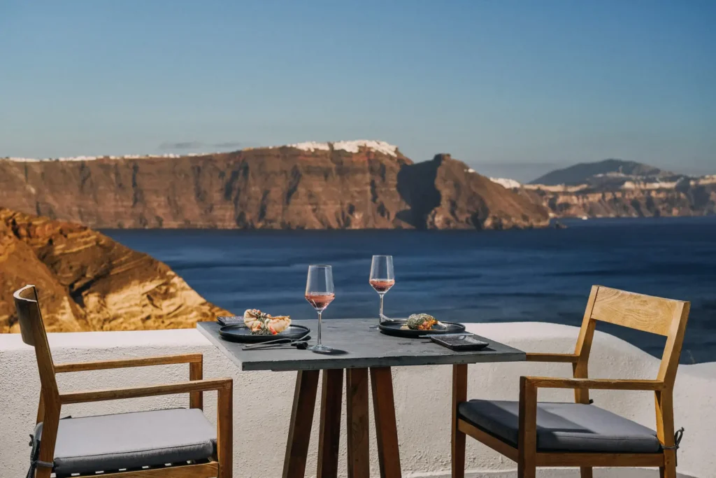 Sunset table setting at Lure Restaurant overlooking the Santorini Caldera