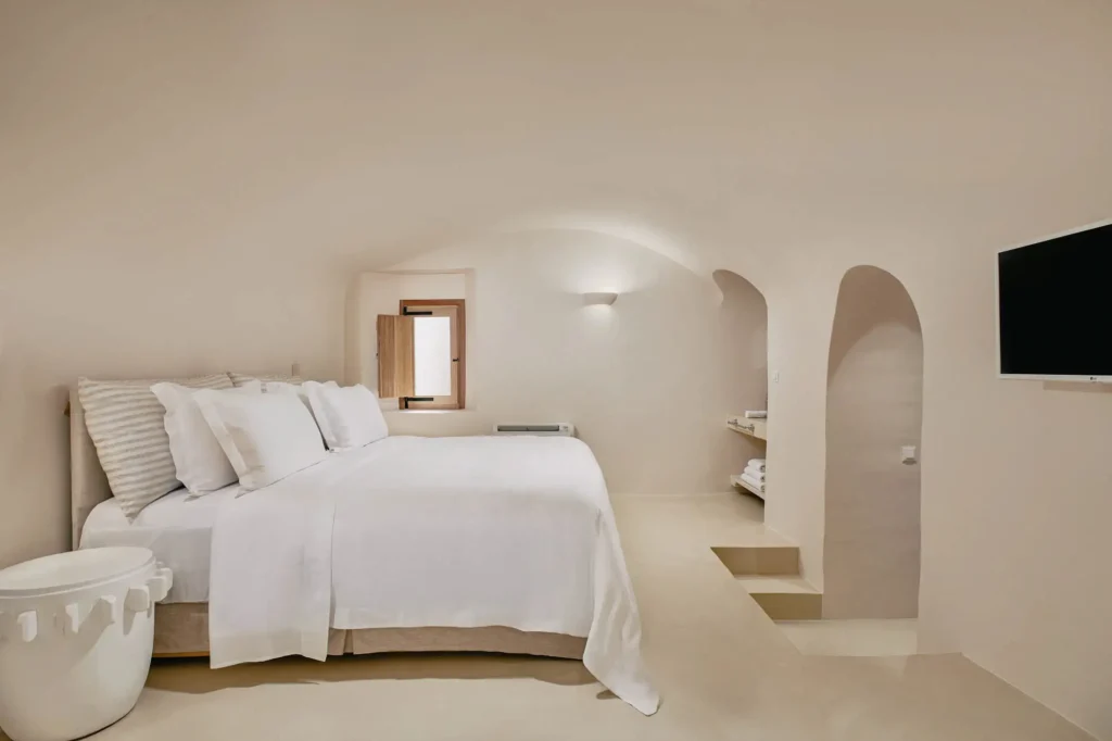 Luxury guest room inside The Mill Haven windmill in Oia Santorini