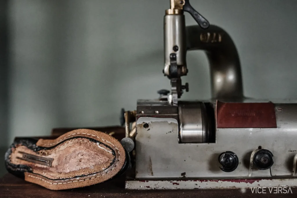 vintage sewing machine in shoemakers lab