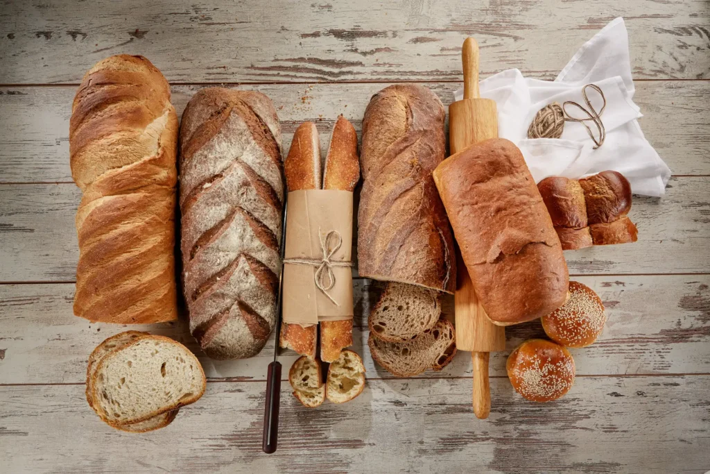 Bakery display with breads, baguettes and buns at Cupitol
