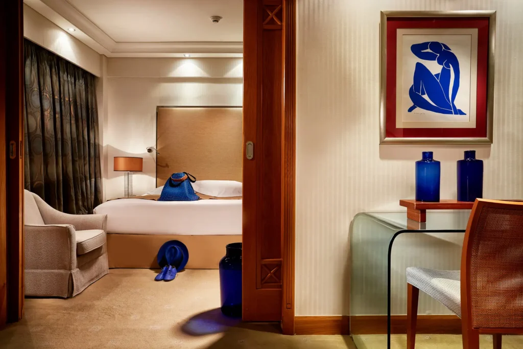 Rodos Park guest room with blue interior accents