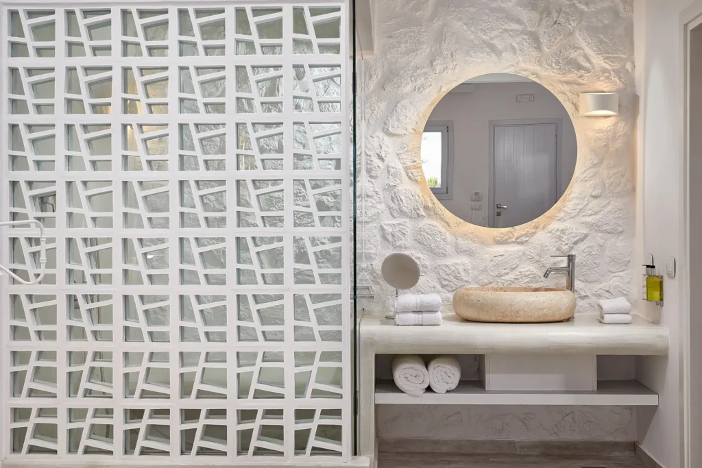 Bathroom at Petri Suites with decorative claustra detail