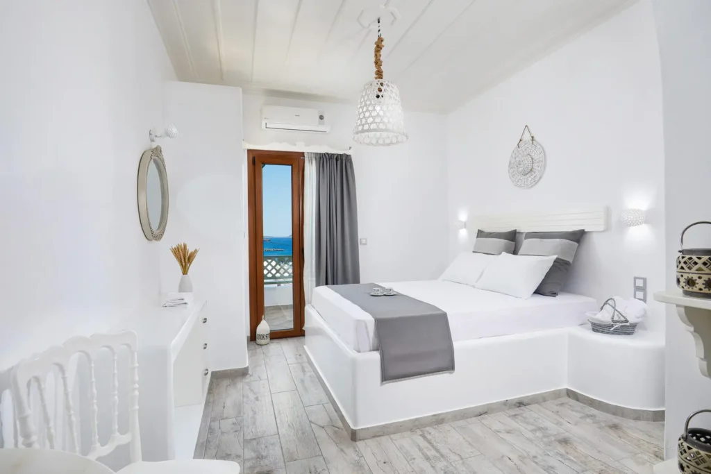Whitewashed room interior at Agnadi Studios in Astypalaia
