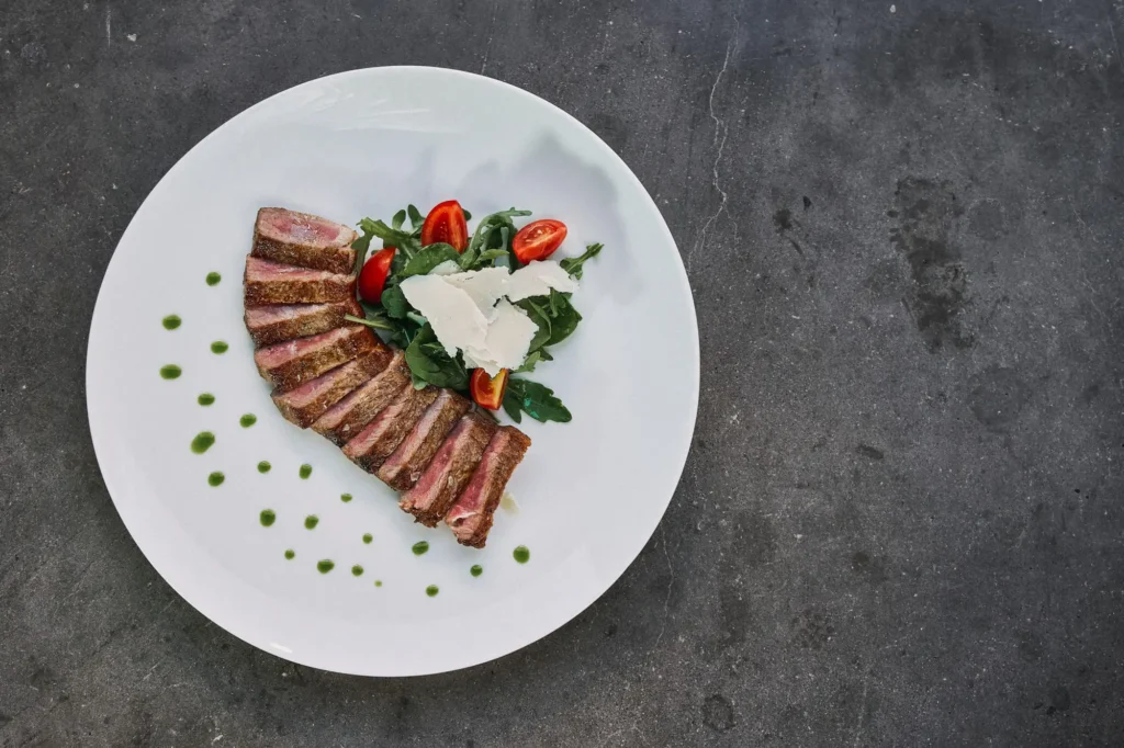 Tagliata with creative plating at Alati Restaurant Santorini