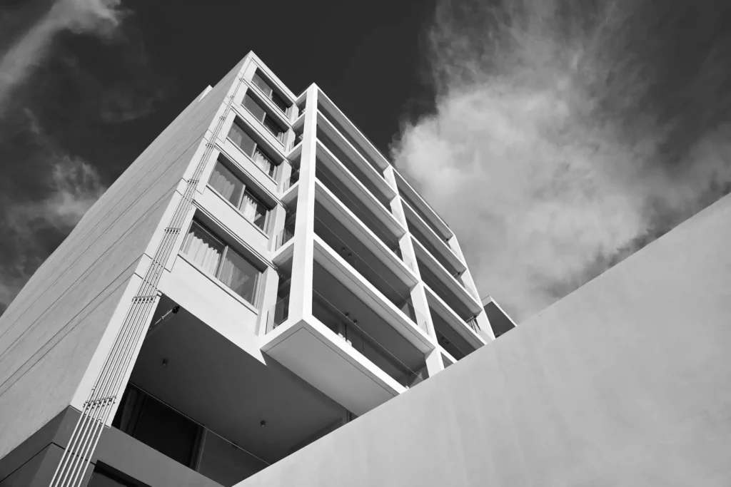 Black-and-white exterior architecture of Crystal Waters on the Athenian Riviera