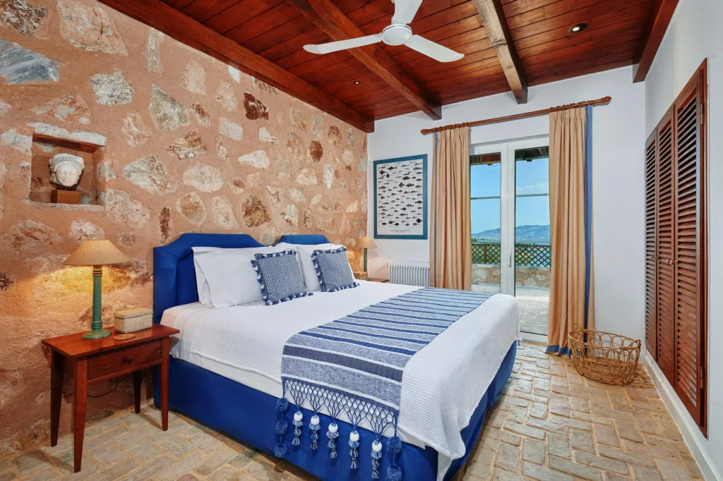 Villa Halioussa interior with terracotta floor and wooden furniture