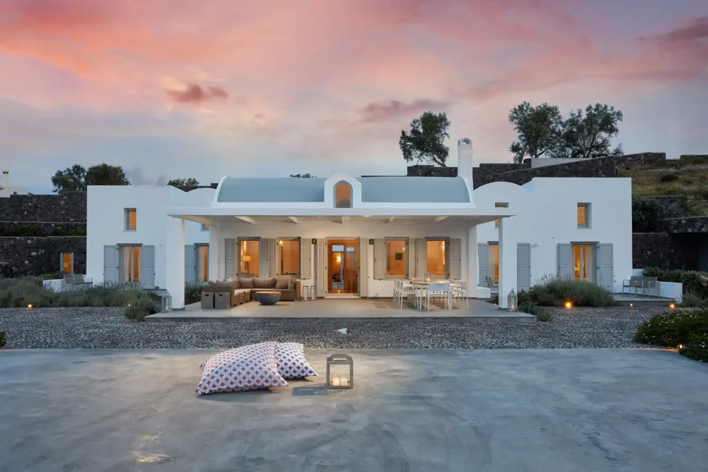 Aerial view of Akrotiri Private Residence at sunset