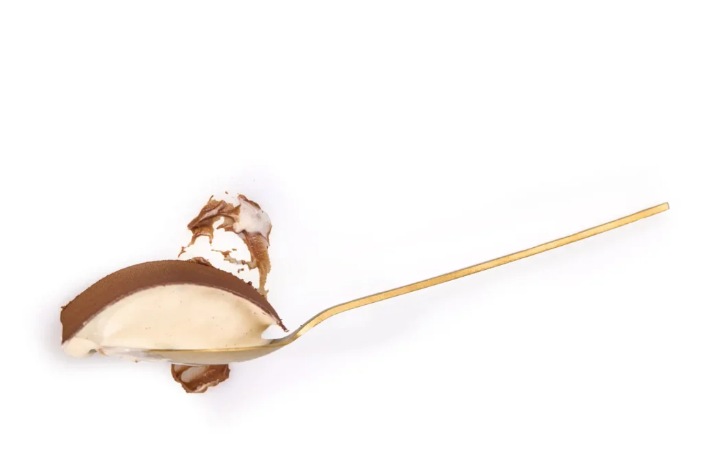 Styled Callebaut chocolate dessert with brushed metal spoon