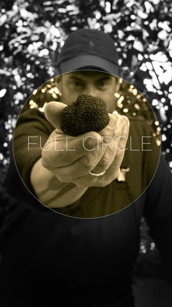 Full Circle burrata and honey episode cover with Athinagoras Kostakos holding a dark textured ingredient