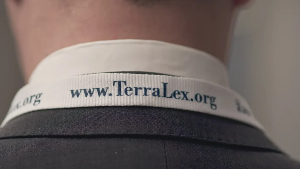 TerraLex lanyard around the neck of a person wearing a suit